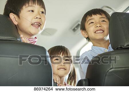 Japanese family in the car View Large Photo Image Picture - Japanese family in the car. Fotosearch