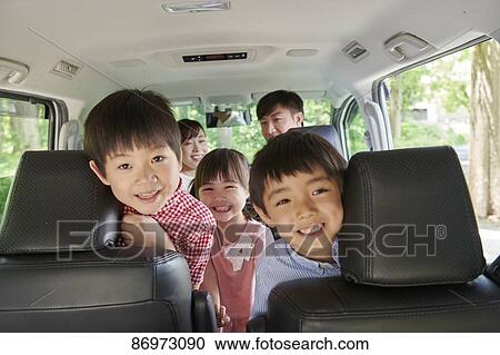 Japanese family in the car View Large Photo Image Stock Image - Japanese family in the car. Fotosearch