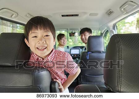 Japanese family in the car View Large Photo Image Stock Image - Japanese family in the car. Fotosearch