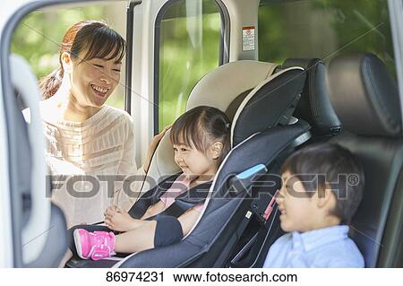 Japanese family in the car View Large Photo Image Stock Image - Japanese family in the car. Fotosearch