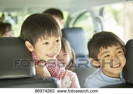 Japanese family in the car View Large Photo Image Stock Image - Japanese family in the car. Fotosearch