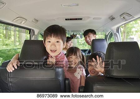 Japanese family in the car View Large Photo Image Stock Photo - Japanese family in the car. Fotosearch