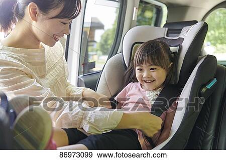 Japanese family in the car View Large Photo Image Stock Photo - Japanese family in the car. Fotosearch