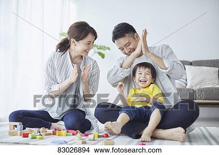 Japanese family in the living room View Large Photo Image Picture - Japanese family in the living room. Fotosearch