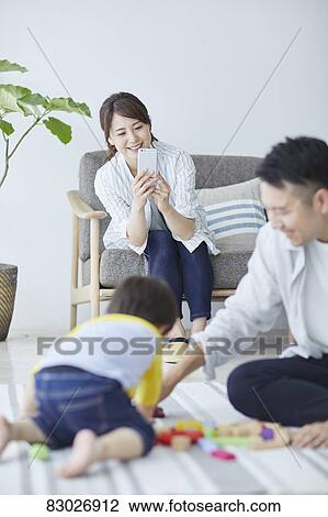 Japanese family in the living room View Large Photo Image Stock Image - Japanese family in the living room. Fotosearch