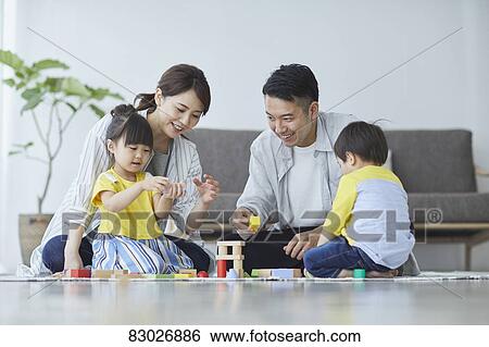Japanese family in the living room View Large Photo Image Stock Photograph - Japanese family in the living room. Fotosearch