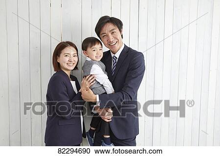 Japanese family studio photo shoot View Large Photo Image Stock Image - Japanese family studio photo shoot. Fotosearch