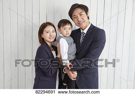 Japanese family studio photo shoot View Large Photo Image Stock Image - Japanese family studio photo shoot. Fotosearch