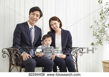 Japanese family studio photo shoot View Large Photo Image Stock Photo - Japanese family studio photo shoot. Fotosearch