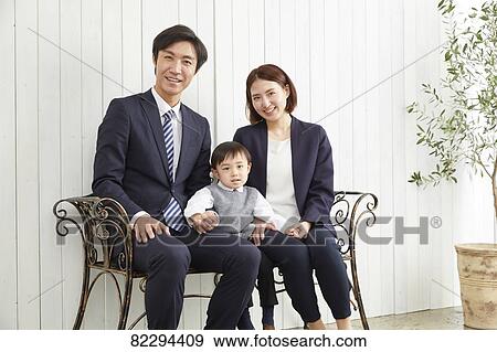 Japanese family studio photo shoot View Large Photo Image Stock Photo - Japanese family studio photo shoot. Fotosearch