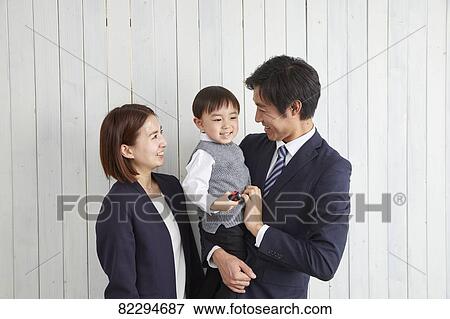 Japanese family studio photo shoot View Large Photo Image Stock Photo - Japanese family studio photo shoot. Fotosearch