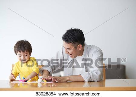 Japanese father and kid playing View Large Photo Image Picture - Japanese father and kid playing. Fotosearch