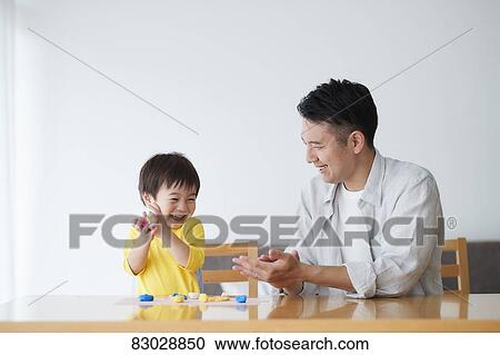 Japanese father and kid playing View Large Photo Image Stock Image - Japanese father and kid playing. Fotosearch