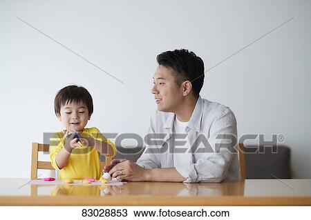 Japanese father and kid playing View Large Photo Image Stock Image - Japanese father and kid playing. Fotosearch
