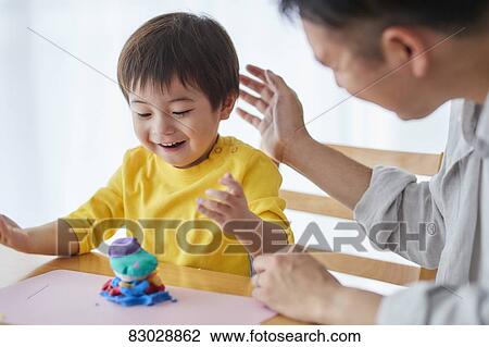 Japanese father and kid playing View Large Photo Image Stock Image - Japanese father and kid playing. Fotosearch