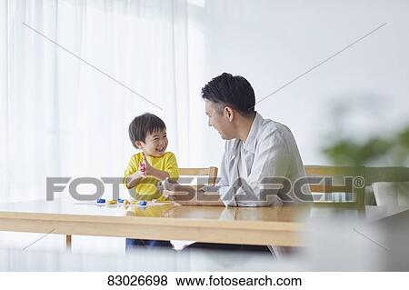 Japanese father and kid playing View Large Photo Image Stock Photo - Japanese father and kid playing. Fotosearch