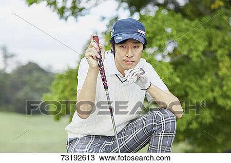 Japanese golf player on course View Large Photo Image Stock Image - Japanese golf player on course. Fotosearch