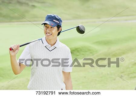 Japanese golf player on course View Large Photo Image Stock Image - Japanese golf player on course. Fotosearch