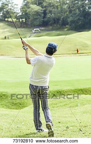 Japanese golf player on course View Large Photo Image Stock Image - Japanese golf player on course. Fotosearch
