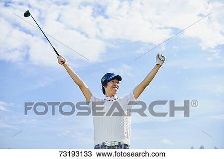 Japanese golf player on course View Large Photo Image Stock Image - Japanese golf player on course. Fotosearch
