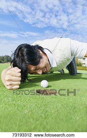 Japanese golf player on course View Large Photo Image Stock Image - Japanese golf player on course. Fotosearch
