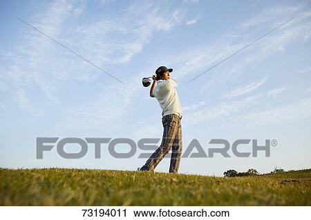 Japanese golf player on course View Large Photo Image Stock Image - Japanese golf player on course. Fotosearch