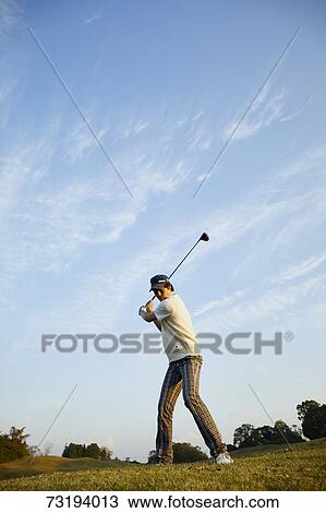 Japanese golf player on course View Large Photo Image Stock Image - Japanese golf player on course. Fotosearch