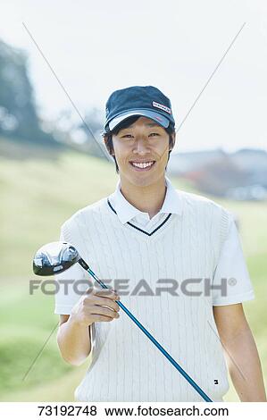 Japanese golf player on course View Large Photo Image Stock Photo - Japanese golf player on course. Fotosearch