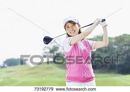 Japanese golf player on course View Large Photo Image Stock Photo - Japanese golf player on course. Fotosearch