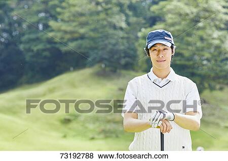 Japanese golf player on course View Large Photo Image Stock Photo - Japanese golf player on course. Fotosearch