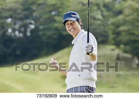 Japanese golf player on course View Large Photo Image Stock Photo - Japanese golf player on course. Fotosearch