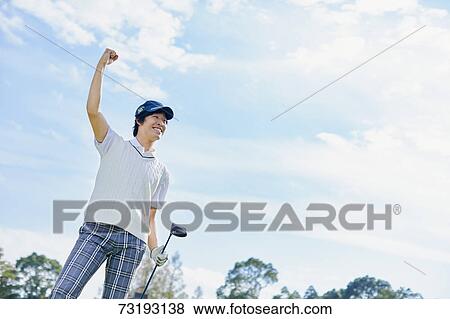Japanese golf player on course View Large Photo Image Stock Photo - Japanese golf player on course. Fotosearch