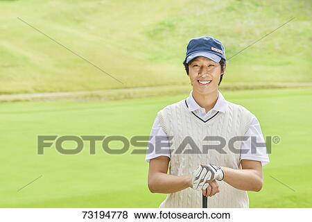 Japanese golf player on course View Large Photo Image Stock Photo - Japanese golf player on course. Fotosearch