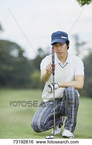 Japanese golf player on course View Large Photo Image Stock Photograph - Japanese golf player on course. Fotosearch