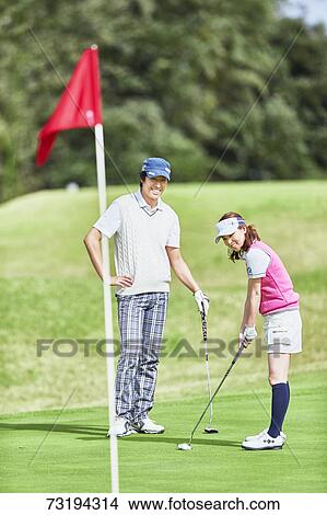 Japanese golf players on course View Large Photo Image Picture - Japanese golf players on course. Fotosearch