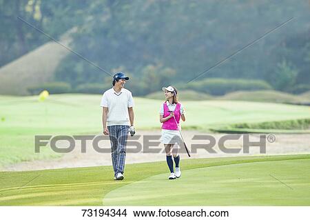 Japanese golf players on course View Large Photo Image Picture - Japanese golf players on course. Fotosearch