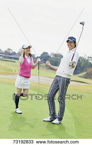 Japanese golf players on course View Large Photo Image Stock Image - Japanese golf players on course. Fotosearch