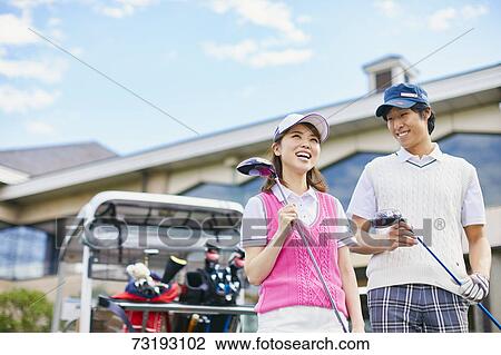 Japanese golf players on course View Large Photo Image Stock Image - Japanese golf players on course. Fotosearch