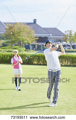 Japanese golf players on course View Large Photo Image Stock Image - Japanese golf players on course. Fotosearch