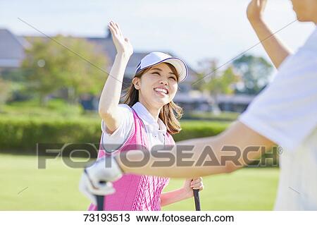Japanese golf players on course View Large Photo Image Stock Image - Japanese golf players on course. Fotosearch