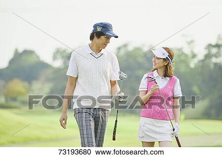 Japanese golf players on course View Large Photo Image Stock Image - Japanese golf players on course. Fotosearch