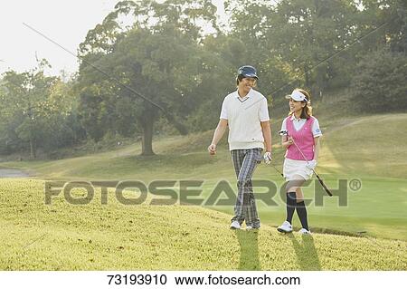 Japanese golf players on course View Large Photo Image Stock Image - Japanese golf players on course. Fotosearch