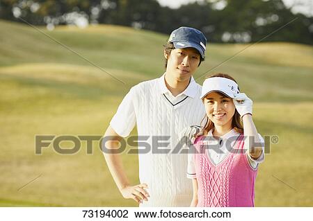 Japanese golf players on course View Large Photo Image Stock Image - Japanese golf players on course. Fotosearch