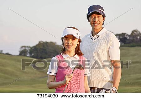 Japanese golf players on course View Large Photo Image Stock Image - Japanese golf players on course. Fotosearch