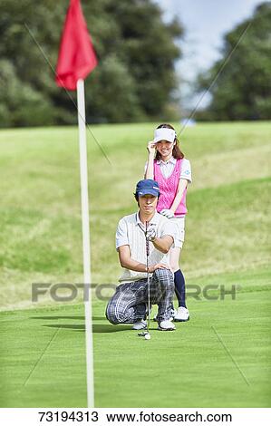 Japanese golf players on course View Large Photo Image Stock Image - Japanese golf players on course. Fotosearch