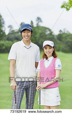 Japanese golf players on course View Large Photo Image Stock Photo - Japanese golf players on course. Fotosearch