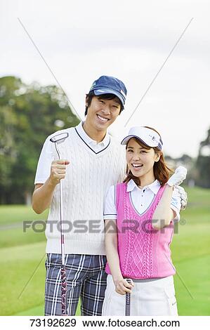 Japanese golf players on course View Large Photo Image Stock Photo - Japanese golf players on course. Fotosearch