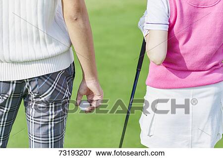 Japanese golf players on course View Large Photo Image Stock Photo - Japanese golf players on course. Fotosearch