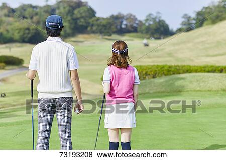 Japanese golf players on course View Large Photo Image Stock Photo - Japanese golf players on course. Fotosearch