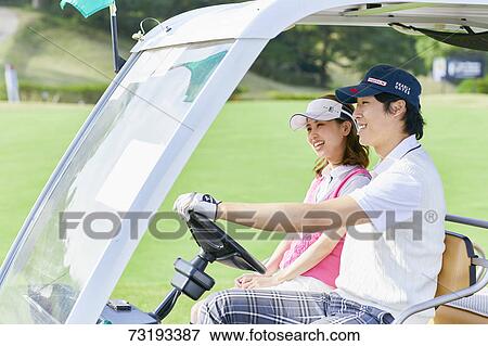 Japanese golf players on course View Large Photo Image Stock Photo - Japanese golf players on course. Fotosearch